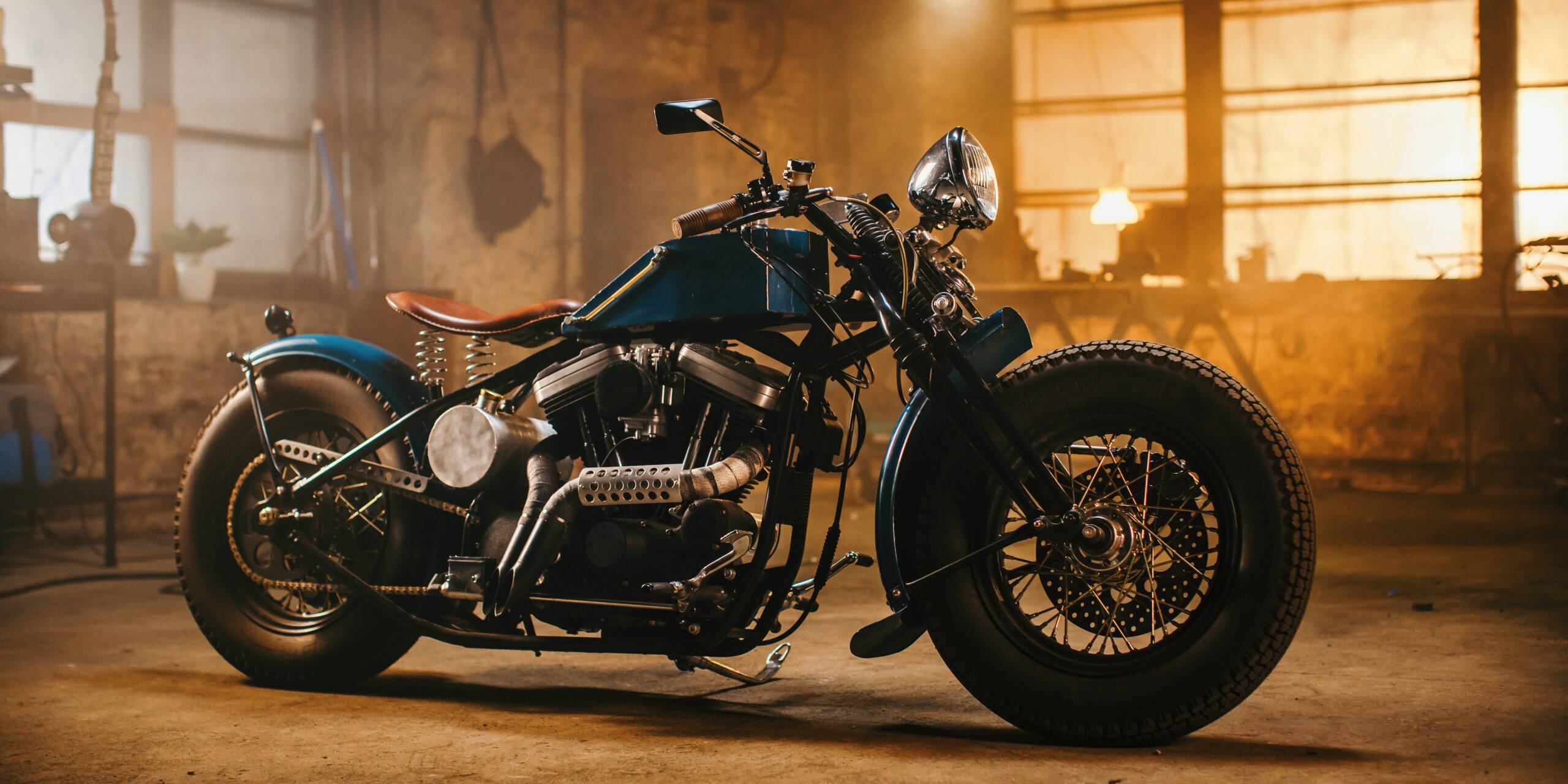 Custom Bobber Motorbike Standing In An Authentic Creative Worksh Custom Bobber Motorbike Standing In An Authentic Creative Worksh